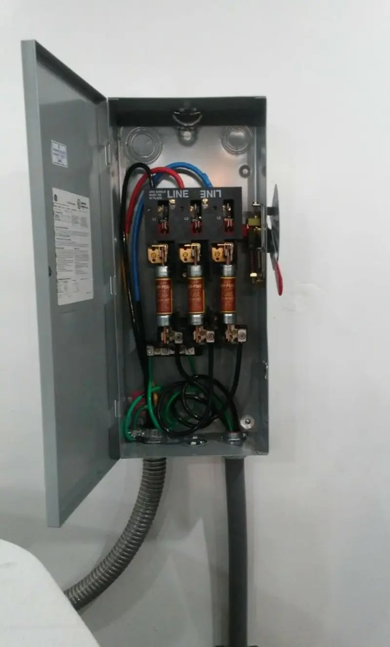 Three-phase disconnect switch installed for Smoke Detector Installation in Lynchburg, Moore County